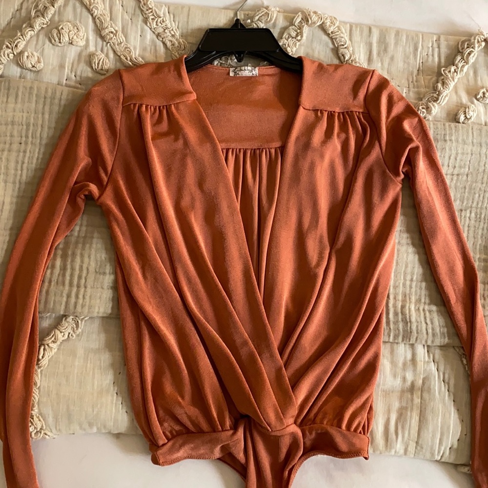 Free People champagne pink bodysuit size XS